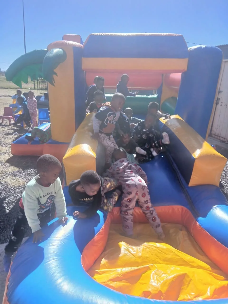 Young children playing with educational toys in the creche